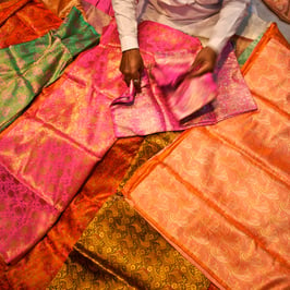 Legends of India, a small group tour. Fabrics in Chandni Chowk market, Delhi.