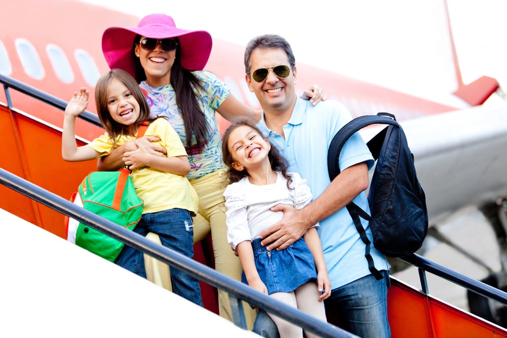 Family going on a trip traveling by airplane