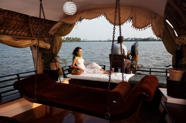 Legends of India, a small group tour. Experience a traditional houseboat in Kerala.