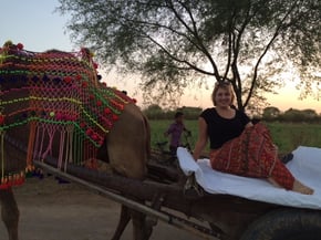 One of Sodha Travel's guests, Molly, on the camel safari