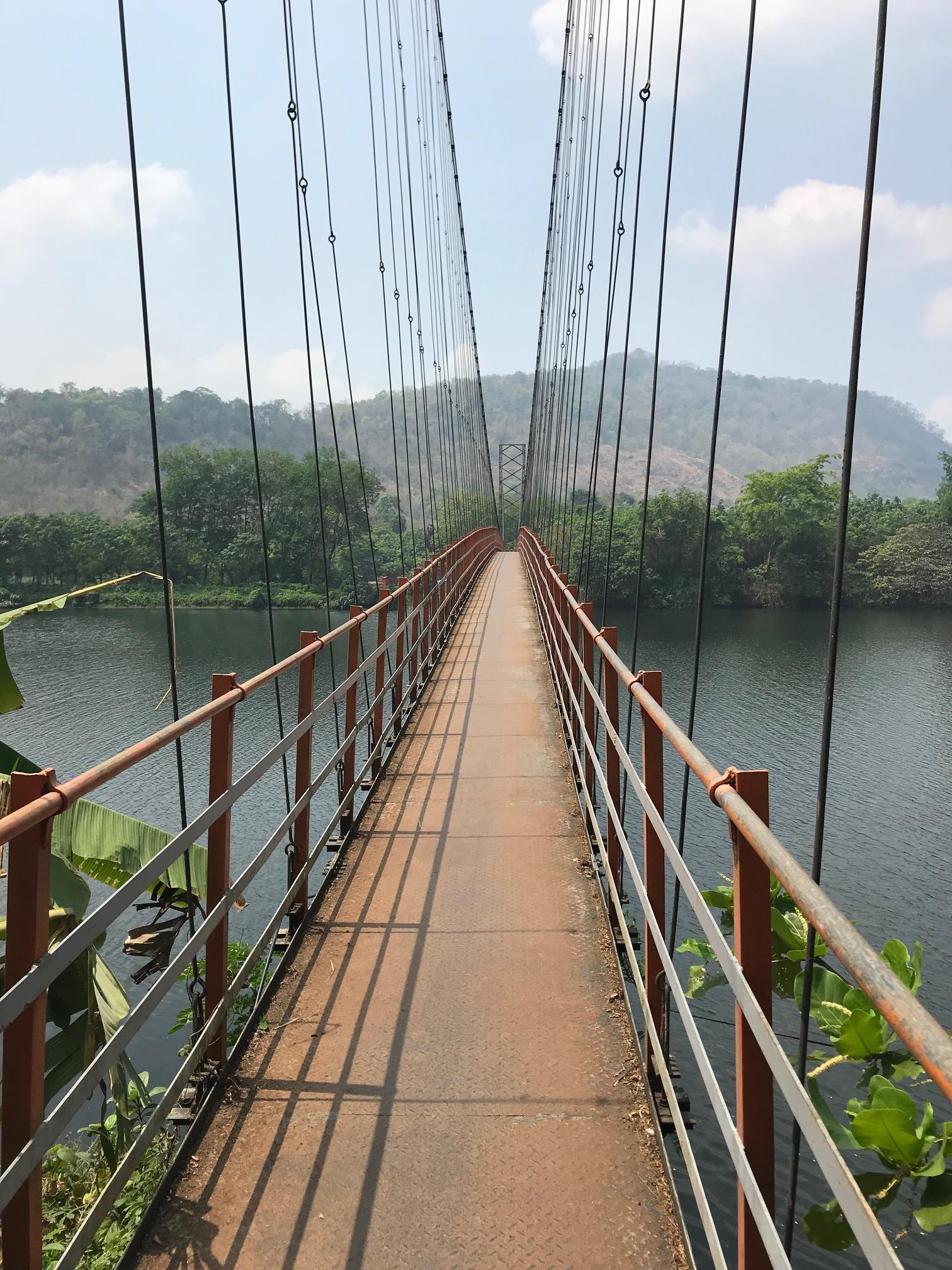 Walk or cycle to the nearby suspension bridge over the Periyar River 