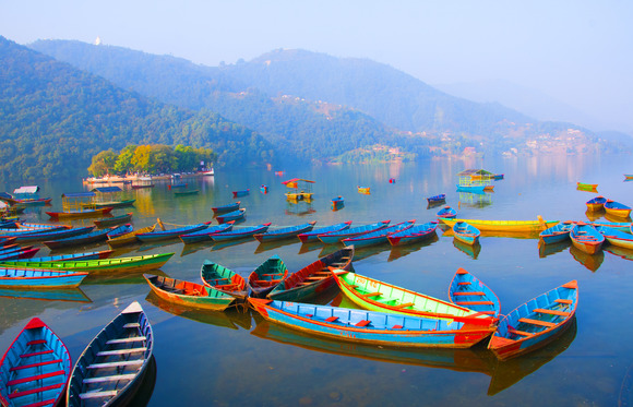 colorful-wooden-boat-at-fewa-lake-pokhara-nepal-2021-12-24-05-06-58-utc (1)